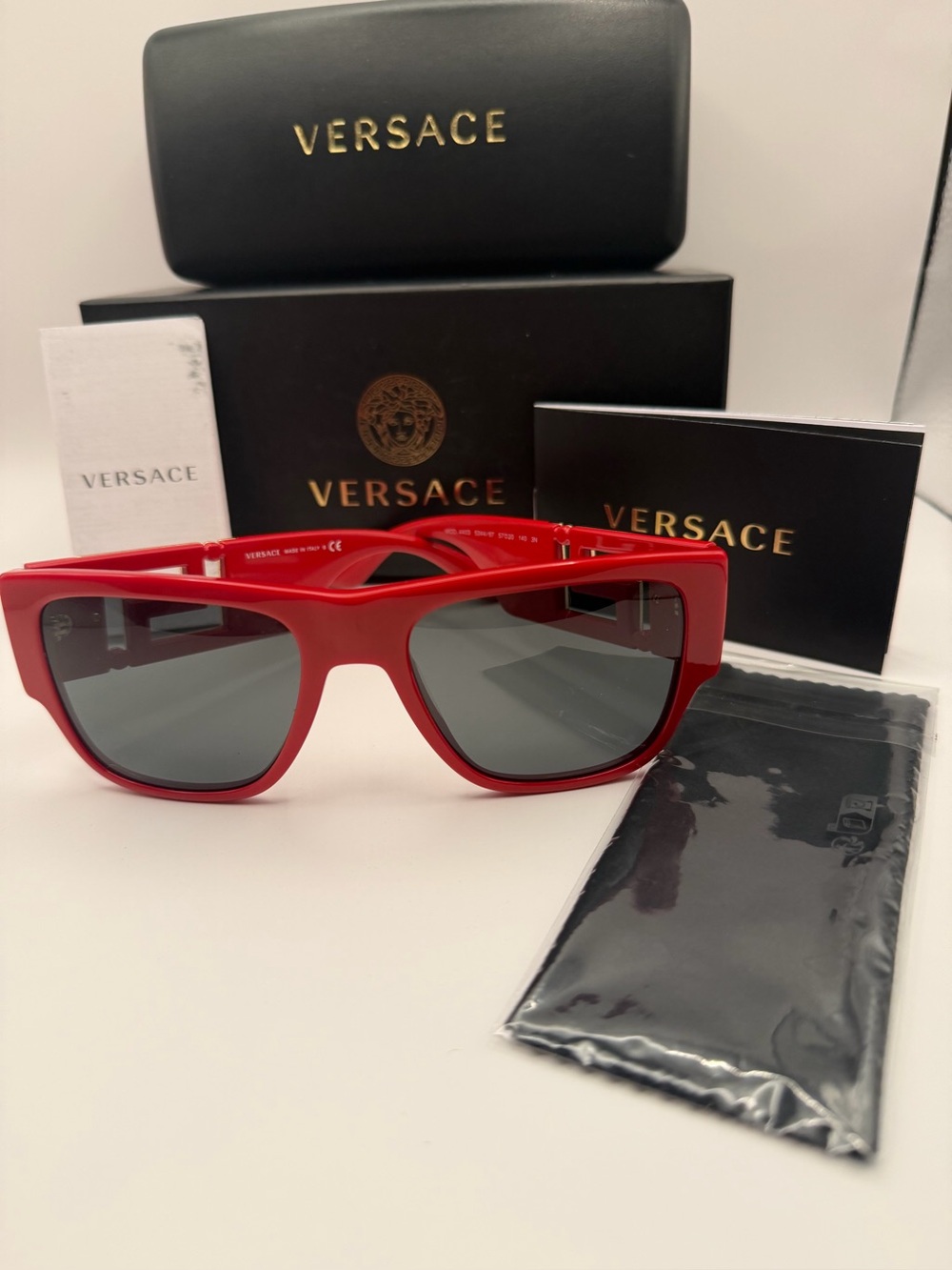 Versace Red Sunglasses with Dark Lenses. With COA